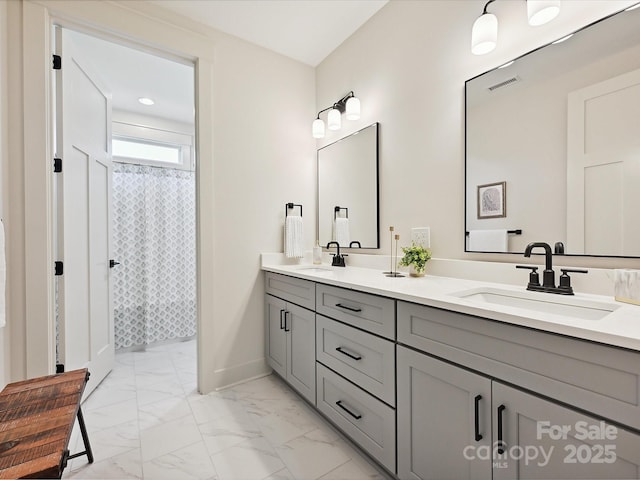 1172 Springlake Rd, York, SC 29745 - bathroom with marble look tile flooring, double vanity, baseboards, a shower with shower curtain, and recessed lighting