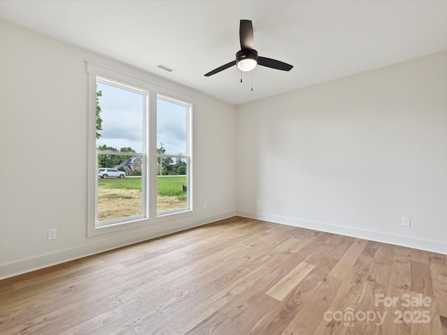 1172 Springlake Rd, York, SC 29745 - unfurnished room featuring light wood finished floors, a ceiling fan, and baseboards