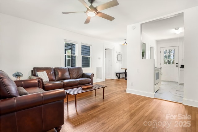 17 Springdale Ave, Asheville, NC 28803 - living area with ceiling fan, light wood-type flooring, and baseboards