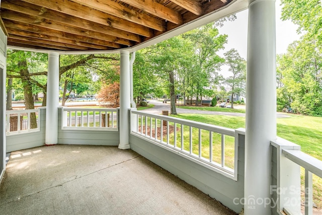 302 NW Dr, Davidson, NC 28036 - porch featuring a lawn