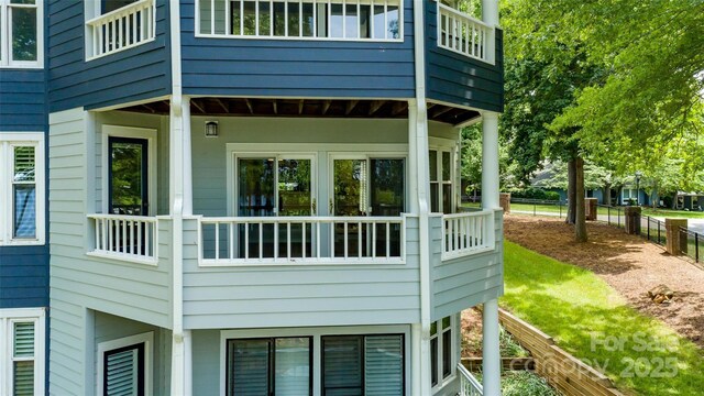 302 NW Dr, Davidson, NC 28036 - view of side of property with a balcony