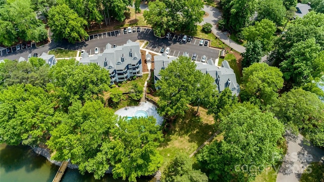 302 NW Dr, Davidson, NC 28036 - aerial overview of property's location featuring a nearby body of water and a tree filled landscape