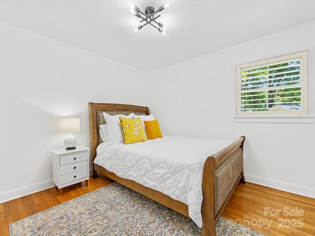 17835 Terryglass Ln, Charlotte, NC 28278 - bedroom featuring wood finished floors, baseboards, and ornamental molding