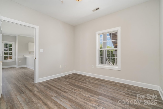 8969 Meadow Vista Rd, Charlotte, NC 28213 - empty room featuring dark wood finished floors and baseboards