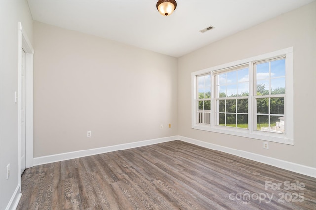 8969 Meadow Vista Rd, Charlotte, NC 28213 - unfurnished room featuring dark wood-style floors and baseboards
