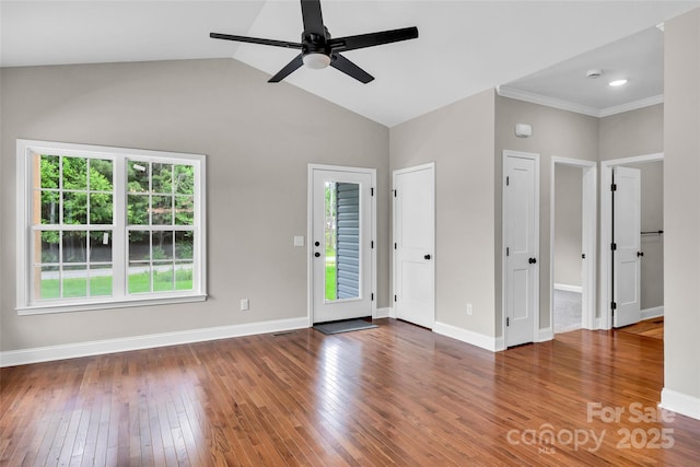 160 Wayne Gobble Rd, Linwood, NC 27299 - unfurnished living room featuring wood-type flooring, ceiling fan, baseboards, and vaulted ceiling