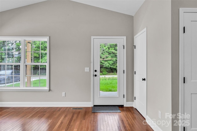 160 Wayne Gobble Rd, Linwood, NC 27299 - entrance foyer with wood-type flooring, vaulted ceiling, and baseboards