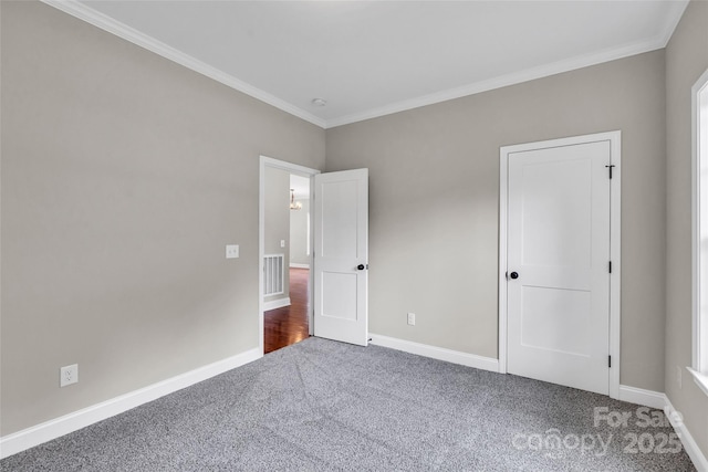 160 Wayne Gobble Rd, Linwood, NC 27299 - unfurnished bedroom featuring carpet floors, crown molding, and baseboards