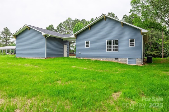 160 Wayne Gobble Rd, Linwood, NC 27299 - rear view of house featuring a yard, cooling unit, and crawl space