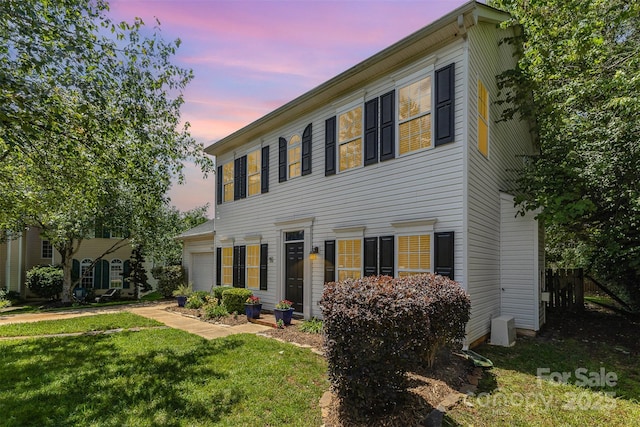 9107 Royal Highlands Ct, Charlotte, NC 28277 - colonial inspired home featuring a front lawn and a garage