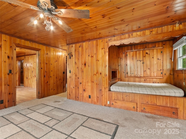 49 Caring Place Loop, Clyde, NC 28721 - unfurnished bedroom with wooden walls, carpet flooring, and wood ceiling