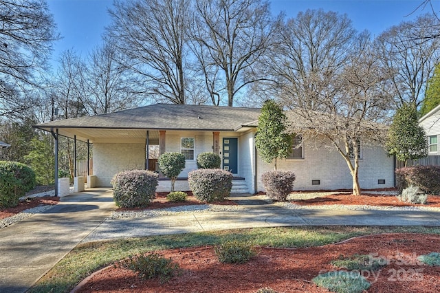 532 Scaleybark Rd, Charlotte, NC 28209 - view of front of home featuring crawl space, concrete driveway, brick siding, an attached carport, and covered porch