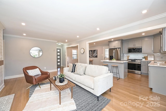 532 Scaleybark Rd, Charlotte, NC 28209 - living area with recessed lighting, light wood-style flooring, baseboards, and ornamental molding