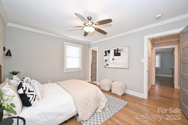 532 Scaleybark Rd, Charlotte, NC 28209 - bedroom featuring ornamental molding, baseboards, light wood finished floors, and a ceiling fan
