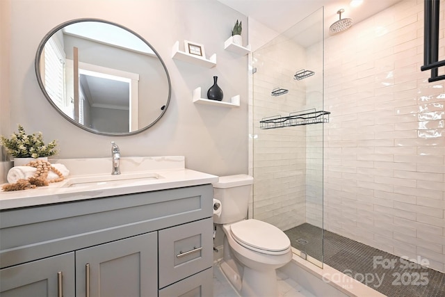 532 Scaleybark Rd, Charlotte, NC 28209 - full bathroom featuring a tile shower, vanity, toilet, and marble finish floors