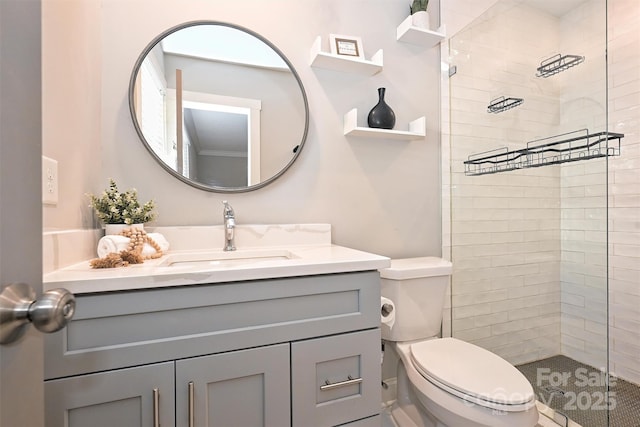 532 Scaleybark Rd, Charlotte, NC 28209 - bathroom featuring tiled shower, vanity, and toilet