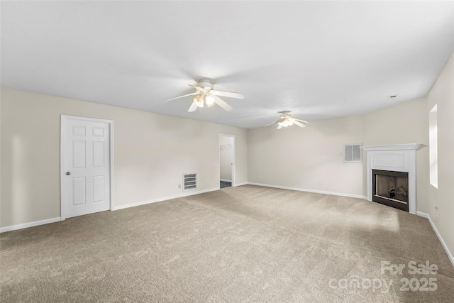 205 Davis Dr, Morganton, NC 28655 - unfurnished living room featuring a ceiling fan, carpet floors, a fireplace, and baseboards