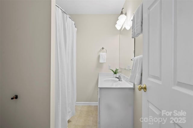 205 Davis Dr, Morganton, NC 28655 - full bathroom with vanity, tile patterned floors, baseboards, and a shower with curtain