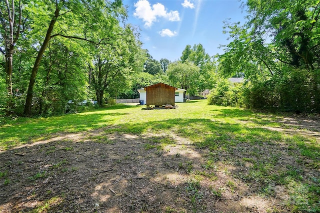 13821 David St, Huntersville, NC 28078 - view of grassy yard with an outdoor structure