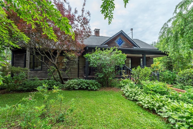 528 Padgettown Rd, Black Mountain, NC 28711 - view of front facade featuring a front lawn, a chimney, and a porch