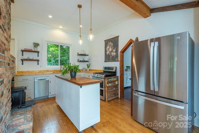528 Padgettown Rd, Black Mountain, NC 28711 - kitchen with appliances with stainless steel finishes, butcher block countertops, open shelves, light wood-style floors, and beam ceiling