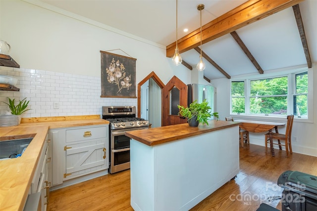 528 Padgettown Rd, Black Mountain, NC 28711 - kitchen featuring wood counters, stainless steel appliances, tasteful backsplash, light wood-style flooring, and white cabinetry