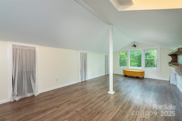 528 Padgettown Rd, Black Mountain, NC 28711 - bonus room featuring wood finished floors, vaulted ceiling, and baseboards