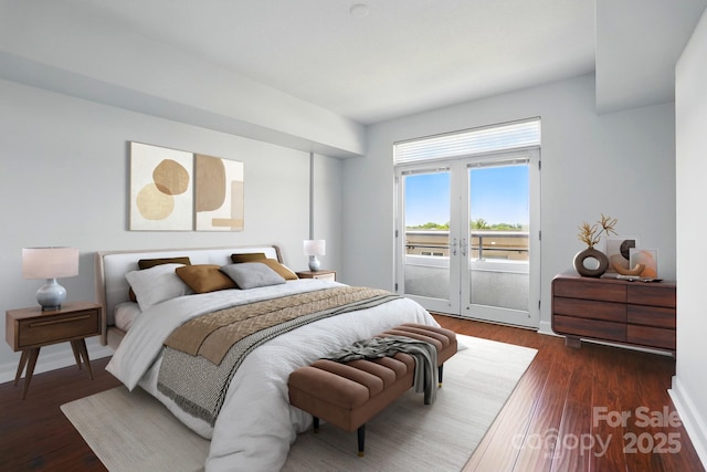 1315 E Blvd Unit 611, Charlotte, NC 28203 - bedroom featuring access to outside and dark wood-style flooring