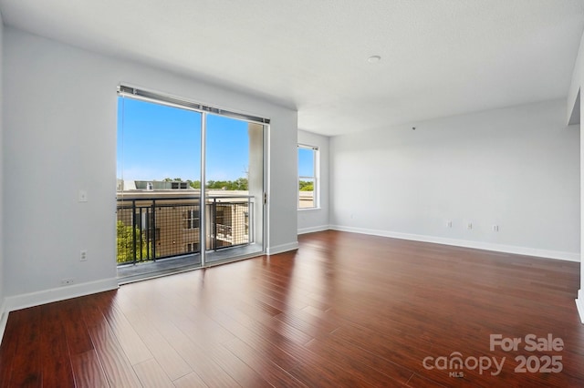 1315 E Blvd Unit 611, Charlotte, NC 28203 - unfurnished room featuring wood finished floors and baseboards