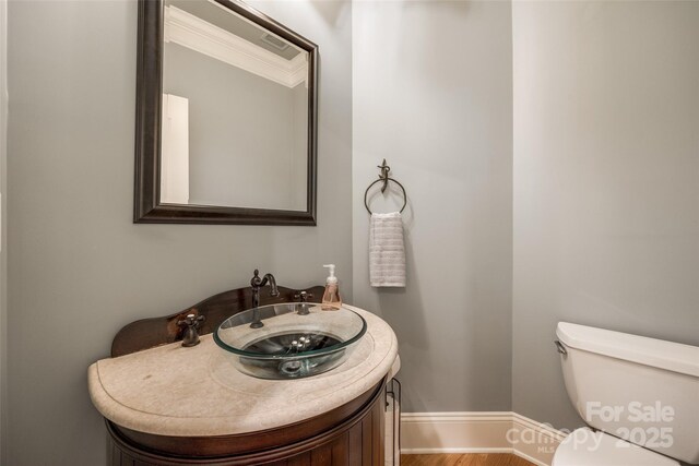 546 Little Cove Ln, Lake Wylie, SC 29710 - half bath with toilet, vanity, baseboards, and wood finished floors