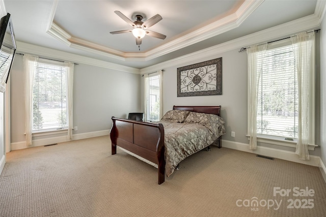546 Little Cove Ln, Lake Wylie, SC 29710 - bedroom featuring multiple windows, ornamental molding, a raised ceiling, light colored carpet, and ceiling fan