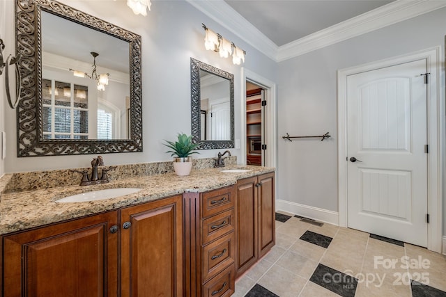 546 Little Cove Ln, Lake Wylie, SC 29710 - bathroom with double vanity, ornamental molding, tile patterned flooring, a chandelier, and baseboards