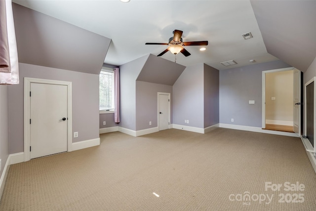 546 Little Cove Ln, Lake Wylie, SC 29710 - additional living space with vaulted ceiling, a ceiling fan, light colored carpet, and baseboards
