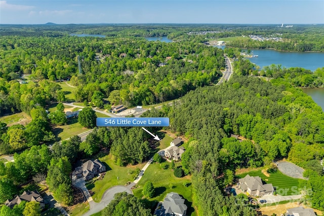 546 Little Cove Ln, Lake Wylie, SC 29710 - aerial view of property and surrounding area featuring a heavily wooded area and a large body of water