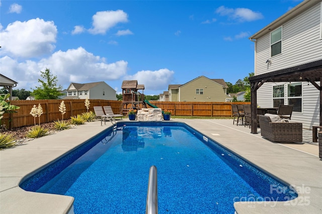 3092 Riker St, Clover, SC 29710 - view of swimming pool with a playground, a fenced backyard, and a patio