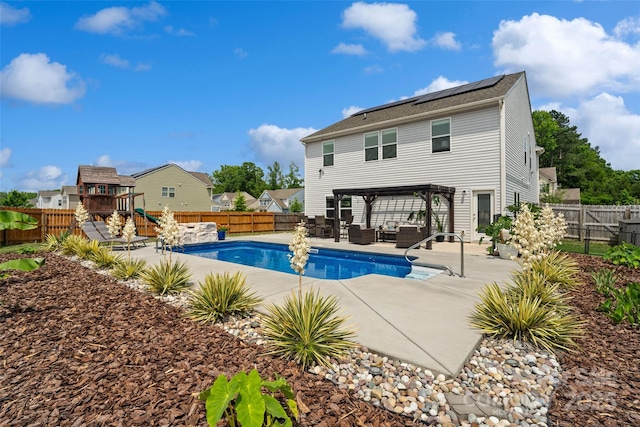 3092 Riker St, Clover, SC 29710 - view of swimming pool with an outdoor hangout area, a playground, a gazebo, and a fenced backyard