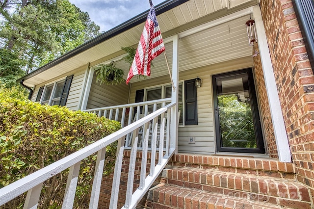2434 Olewoods Ct, Rock Hill, SC 29732 - doorway to property featuring covered porch and brick siding