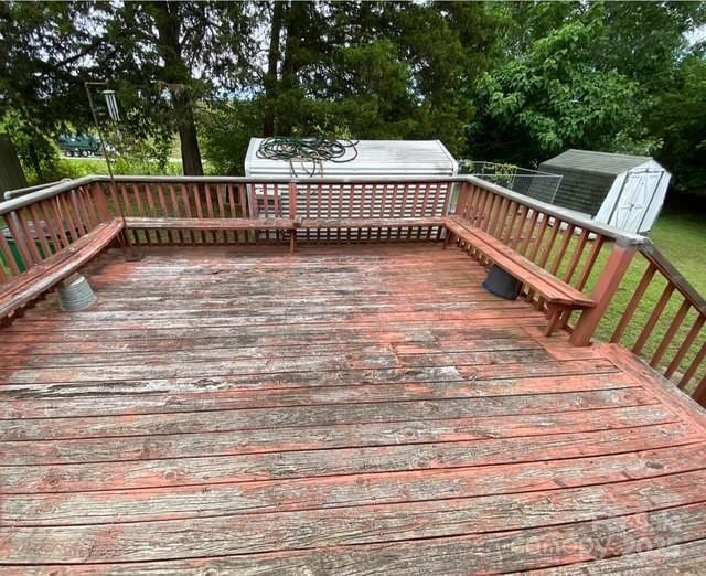 13427 Homewood Dr, Charlotte, NC 28262 - deck with view of scattered trees