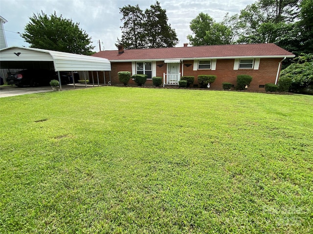 13427 Homewood Dr, Charlotte, NC 28262 - ranch-style house featuring a detached carport, a front yard, and brick siding