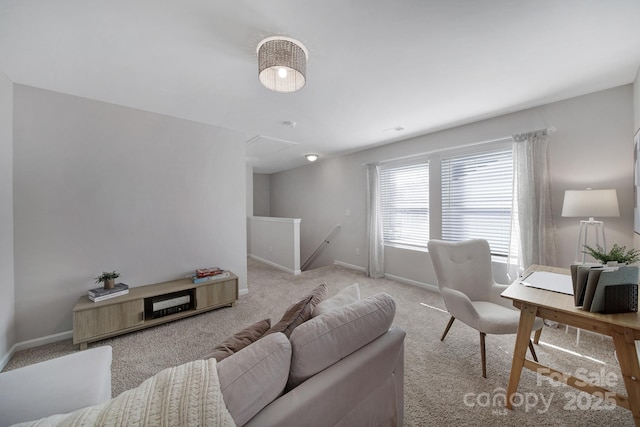 240 Briana Marie Way, Indian Trail, NC 28079 - living room featuring light colored carpet, baseboards, and a desk