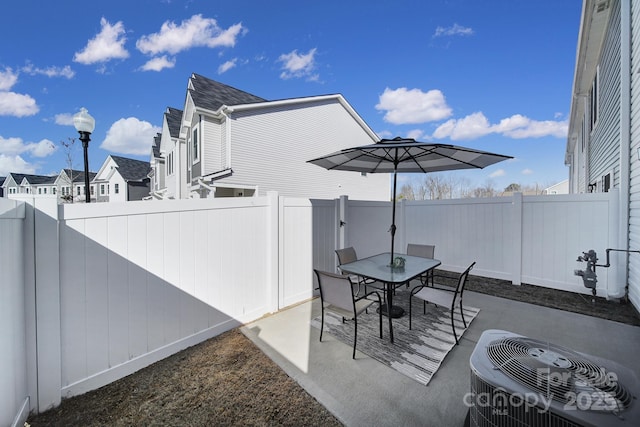 240 Briana Marie Way, Indian Trail, NC 28079 - fenced backyard with a patio, outdoor dining area, and central AC unit