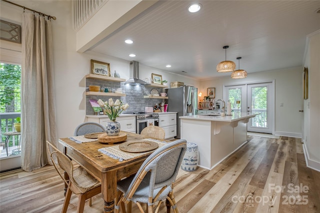206 Independence Trl, Morganton, NC 28655 - dining space featuring light wood finished floors, recessed lighting, and french doors