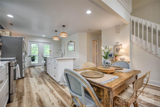206 Independence Trl, Morganton, NC 28655 - dining area featuring stairs, light wood-style flooring, and recessed lighting