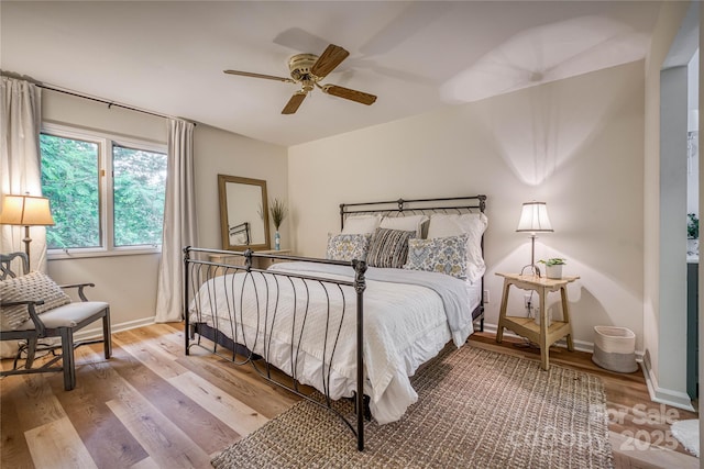 206 Independence Trl, Morganton, NC 28655 - bedroom featuring wood finished floors, baseboards, and ceiling fan