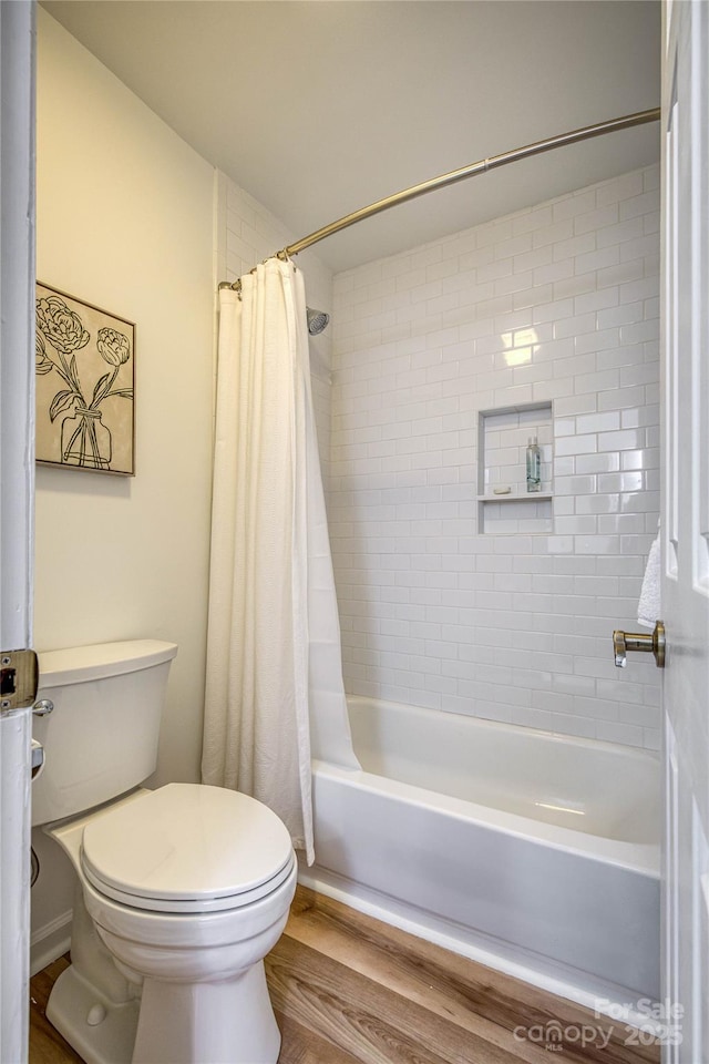 206 Independence Trl, Morganton, NC 28655 - full bathroom featuring toilet, wood finished floors, and shower / tub combo
