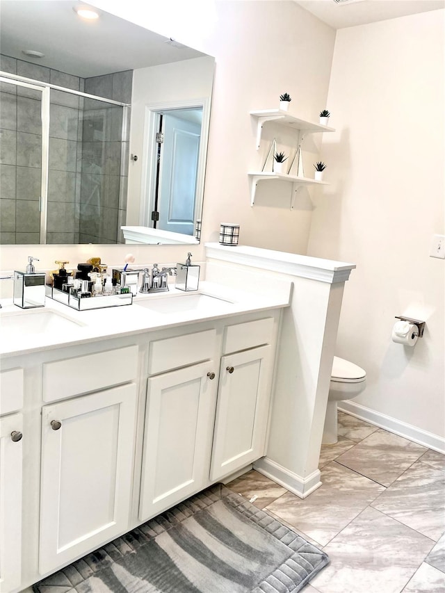 7024 Wheyfield Dr, Charlotte, NC 28215 - full bath with baseboards, a stall shower, marble finish flooring, double vanity, and toilet