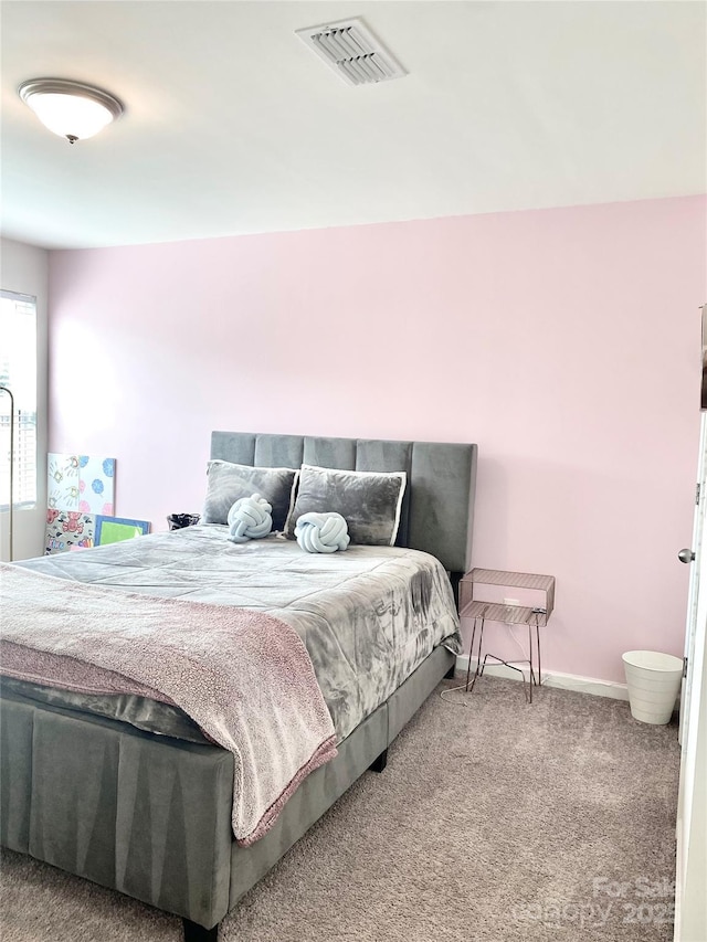 7024 Wheyfield Dr, Charlotte, NC 28215 - carpeted bedroom featuring baseboards