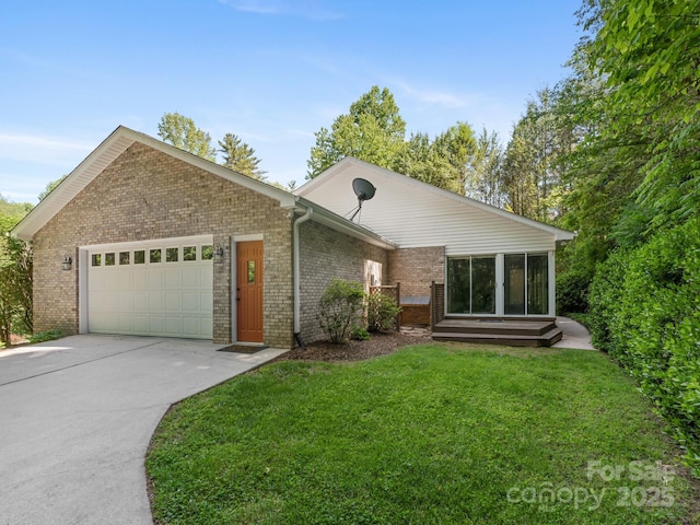18 Westbridge Dr, Hendersonville, NC 28739 - single story home with an attached garage, brick siding, concrete driveway, and a front yard