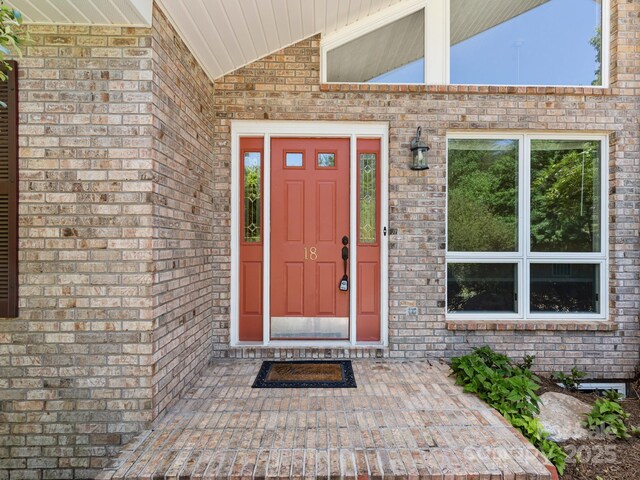 18 Westbridge Dr, Hendersonville, NC 28739 - doorway to property with brick siding