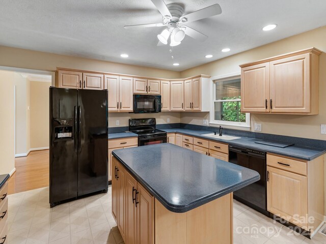 18 Westbridge Dr, Hendersonville, NC 28739 - kitchen featuring black appliances, light brown cabinets, a sink, dark countertops, and recessed lighting